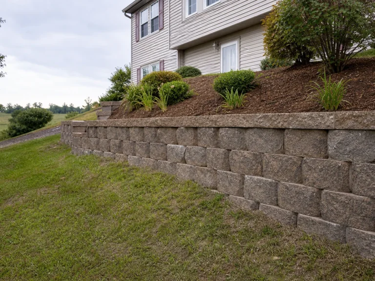 Retaining wall terracing on a sloped lot in Parkersburg, Iowa