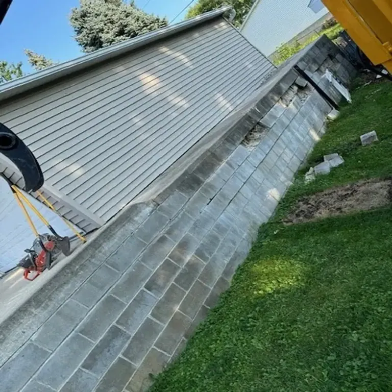 Failing block retaining wall before replacement
