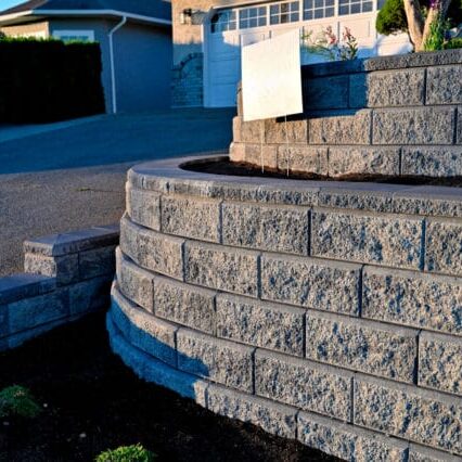 Retaining wall in Cedar Falls, Iowa, designed for stability and improved outdoor aesthetics.