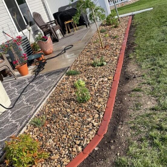 Rock garden in Cedar Falls, Iowa, featuring decorative stones and drought-resistant landscaping.