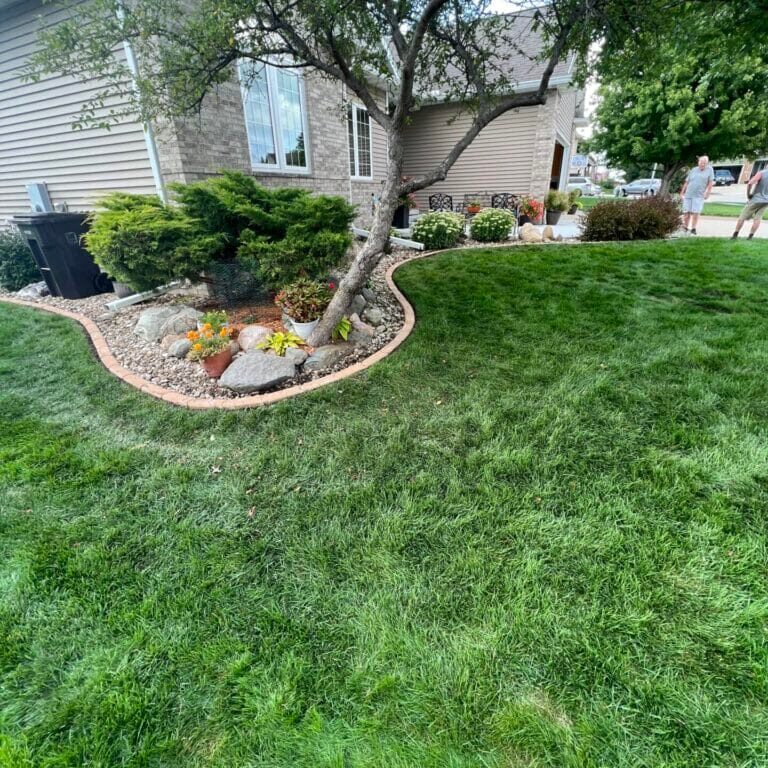 Rock garden in Cedar Falls, Iowa, featuring decorative stones and drought-resistant landscaping.